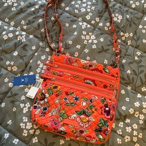 Iconic triple zipper cross body bag